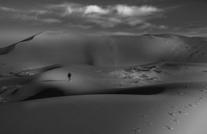 Thinking, tangling shadows in the deep solitude.