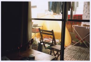 She reads books inside a tent / Tokyo, 2013
