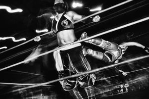 Stuck in the ropes, Mari receives a dropkick from Hikari.