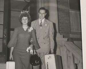 This photograph is in Nanny and Gramps’ wedding album, and was intended to portray them on their wedding night, headed from her home in the Bronx to the airport for their honeymoon in Bermuda. However, it is in fact an enactment of a scene that never happened. They stayed in a hotel the evening of her wedding before heading to the airport.