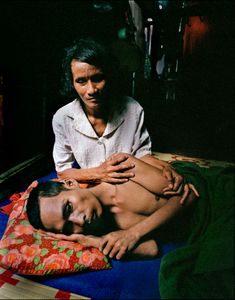 Mother looking after son dying of AIDs, Siem Riep, Cambodia  2001