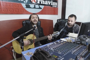 Singer Tolga Kurdoğlu and his friend Erdinç hosting their weekly program on Laz culture at the studio of Radyo Arhavim.