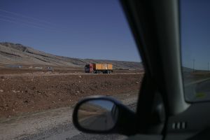 A truck carrying temporary habitation conexs in Eslam abad to Sarpol-e-Zahab road