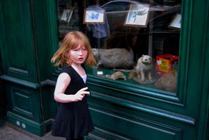 Girl Outside Musée des Rats