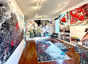 Studio with current oversize digital proofs with generative color.