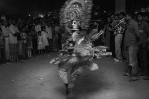 A chhau dancer, on a vigorous move