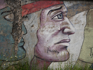 USA. Chicago. 2015. Graffiti of an Indian native crying.