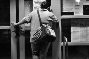 Susana trying to get back into the shelter on a day when there was no work. © Joseph Sorrentino
