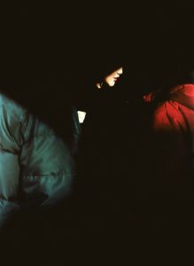 Three persons in the street