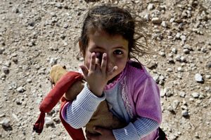 A young girl begging for money. © Tom Verbruggen