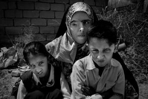 © Christian Werner - Iraq, Basrah, 24 October 2012 - Portrait photo of three siblings, two girls Masoma Hassan Jassim, 8 years old, Madia Habib Hassan, 17 years old and a her cousin. All three were born with a mutation of the eye.