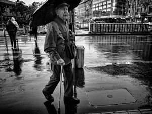 The Old Man in the Rain