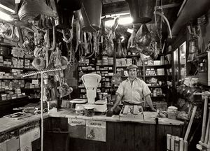 Nicolas Feito running the  store  in Pola de Somiedo, Northern Spain. 1988