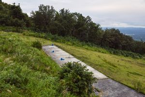 ‘Reclaimed by Nature or Man’, concrete pad is a part of the top of a ski slope of the Mt Myoko Suginohara