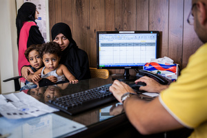 Beirut, LEBANON, September 22, 2014:  Alissa Amad Mohammad Ali (35) and her children, Rona (4), and Amal (2) are receiving an vulnerability assessment at Makhzouni Foundation who collaborated with UNHCR. Alissa has six children and is a single parent since her husband went missing in Syria two years ago.