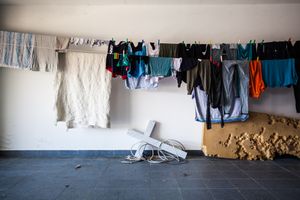 01) Cross, electric cable, mattress with dog marks, laundry