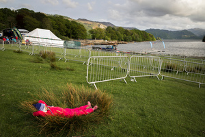 Taking it easy in a red romper-suit.