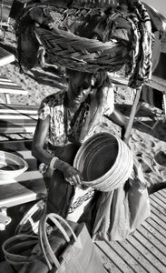 Bags and baskets saleswoman, Ischia 2016, Maronti Beach