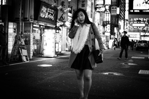 An hostess girl walks in Kabukicho