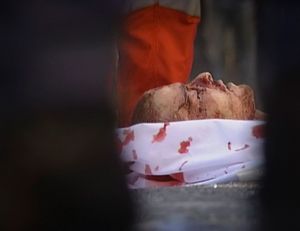 Genoa, Italy (2001). Death of a young man.