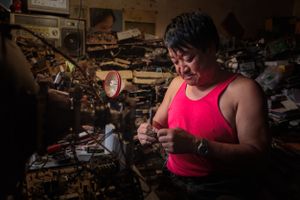 Even though Wang, who had polio, cannot easily visit his customers, they bring electrical items to his shop for repair. The shop was donated by the local Disabled Persons' Federation. Wang's son is studying at university on a  scholarship provided by the DPF.