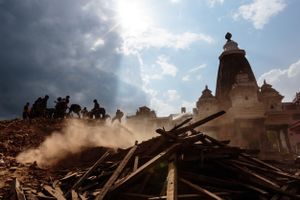 Soldiers from the Nepal Army search through the rubble of an ancient Hindu temple in Patan's Durbar Square.