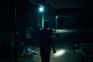 Woman with her flash light.