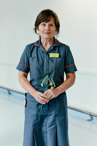 Claire O'Brian, Chief Nurse with Nicotiana alata