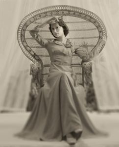 Sitting.