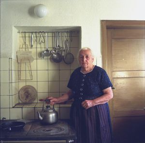Maria Strecker in her kitchen, Black Forest, 2011. From the series: The last women in their traditional peasant garbs