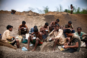 A group of workers eating lunch at the quarry
