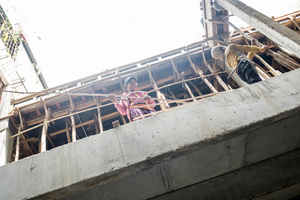 Douek Hut 29 from Pursat Province has been working in construction for 7 years. She feels her boss looks down on her and is in conflict with many of the male workers on the site.