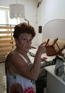 Amalia shows the damages in her house. "Here we are one year after the earthquake and nothing changed or happened" she said.