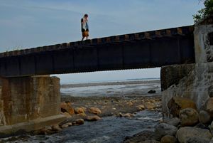 Quebec-Charlevoix-Les Éboulements-Boy on Bridge