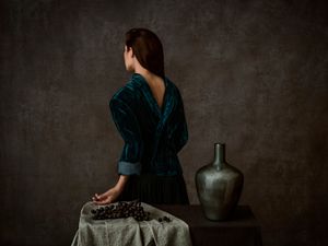 Woman with Grapes
