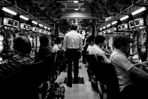 A man walk inside the Pachinko shop in Kabukicho