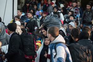 Refugees who arrive at the port of Piraeus after registering at Lesvos are on their way to board coaches and trains heading to Macedonia. Hundreds of refugees were arriving during 2015 every day to Athens after making a risky crossing from Turkey to Lesvos island.