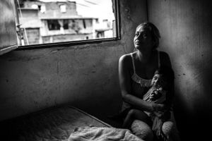 Cantalicia Ramos and her niece. Cantalicia's  son was murdered in January of 2016 by a local gang, now she has to raise her niece.
