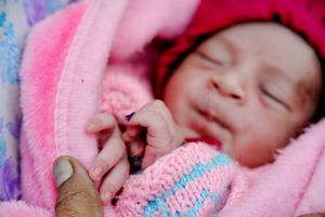 An infant is marked after being vaccinated in Moradabad, Uttar Pradesh