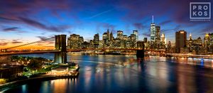 <a href="https://andrewprokos.com/photo/brooklyn-bridge-manhattan-skyline-dusk-panorama-2420/">Panoramic View of Brooklyn Bridge and Lower Manhattan at Dusk</a>