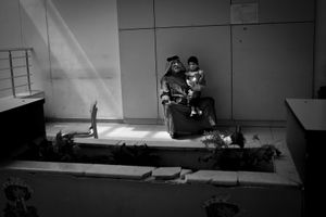 © Christian Werner - Iraq, Basrah, 23 April 2012 – In the Children’s Hospital an old man prays for his grandson. The grandson is suffering from leukemia.