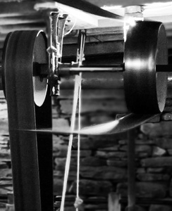 Two Ceiling Mounted Rotating Wheels with Belts