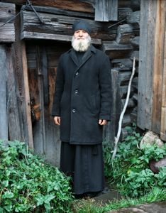 Father Peter at the entrance to his refuge