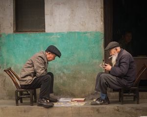 Two Men Playing Game in Hunan