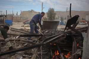 Gathering what’s left from destroyed buildings