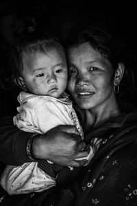 Dhan Maya Ghale hugging her child. A resident of Barpak where the epicenter of the 2015 earthquake was. She lost her daughters, a 6-year-old girl, and a 3-day-old infant.