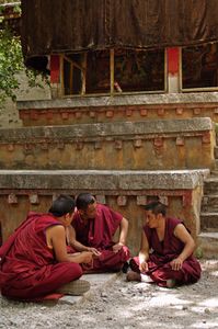 Sera Monastery is outside of Lhasa, Tibet. It is known for the dramatic debates held every day in a grove of trees.Some take a more contemplative approach, quietly and intimately discussing religious issues. Photographed on 29 June 2005© Forest McMullin