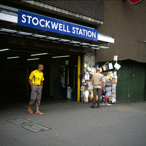 Mourners at the corner of Stockwell Tube station in London the day after the fatal shooting by police of Jean Charles de Menezes suspected of being a terrorist bomber later found to be a case of mistaken identity.