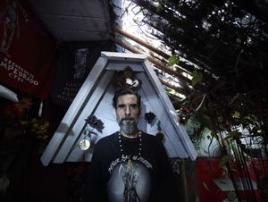 San la Muerte devotee who heals in the name of the popular saint in his  garden dedicated to San la Muerte in Buenos Aires suburbs of Vittoria