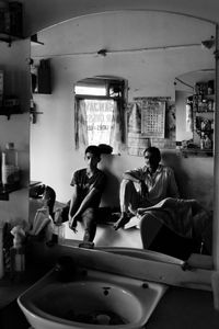 The Barber - Sanjay and his understudy Sameer take a break.